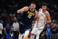 Denver Nuggets center Nikola Jokic drives past OKC Thunder forward Chet Holmgren at Ball Arena. Photo Credit: Imagn